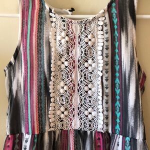 A beautiful flowy pattern dress with a Lacey front
